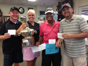 The winning team with a 61 – Mike Mathieu, Tina Scarlett, Kennison Tejada and Brian Dunkle.